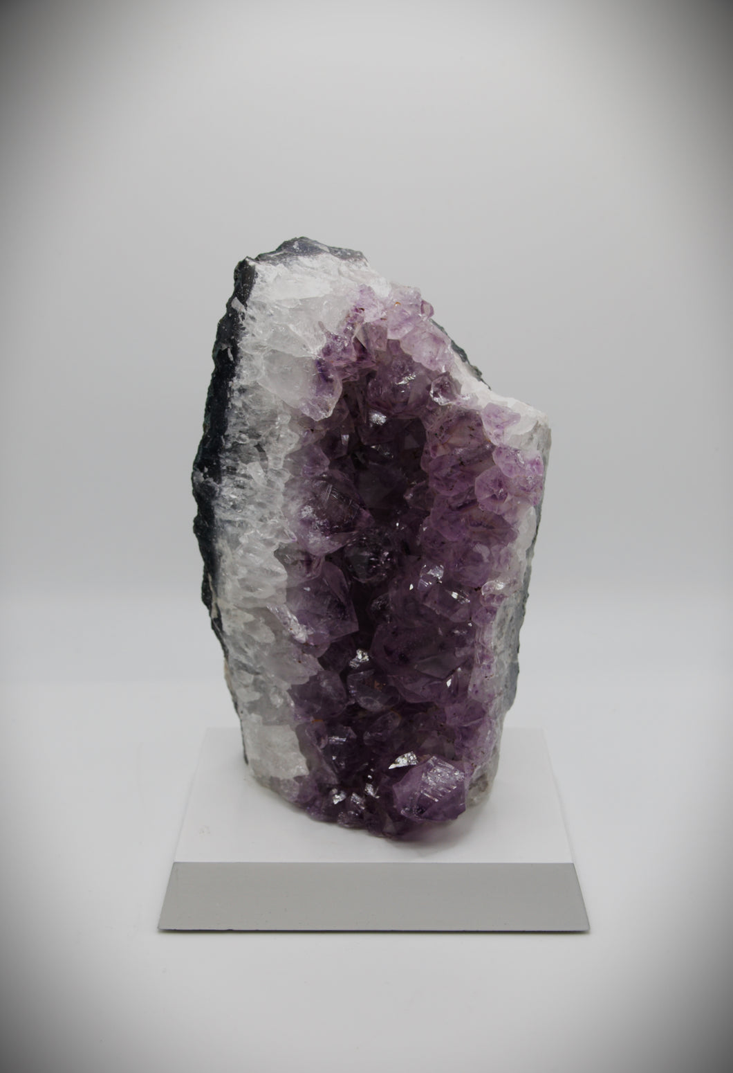 Amethyst Crystal Stone (with white or black polished wooden base)